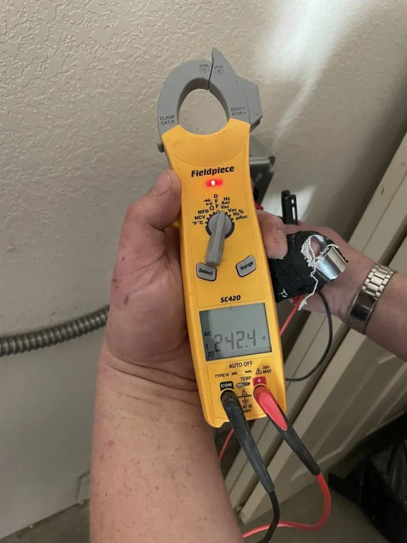 Voltage testing with clamp meter during Aluminum Wiring Replacement in Waco